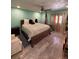 Bright bedroom boasts natural light, cozy decor, and comfortable furnishings at 2220 Wellington Cir, Lithonia, GA 30058