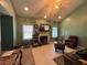 Cozy living room boasting natural light, a fireplace, and inviting decor at 2220 Wellington Cir, Lithonia, GA 30058