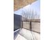 Apartment balcony featuring a glass railing with views of nearby trees at 335 W Ponce De Leon Ave # 506, Decatur, GA 30030