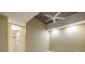 Bright bedroom with a ceiling fan, open closet with built-ins and neutral walls at 335 W Ponce De Leon Ave # 506, Decatur, GA 30030