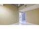 Bedroom view with neutral walls, and concrete ceiling leading to an ensuite bathroom at 335 W Ponce De Leon Ave # 506, Decatur, GA 30030