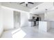 Open kitchen with modern appliances, a concrete ceiling, and stainless steel details at 335 W Ponce De Leon Ave # 506, Decatur, GA 30030