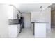 Contemporary kitchen with granite countertops, stainless steel appliances and mosaic backsplash at 335 W Ponce De Leon Ave # 506, Decatur, GA 30030