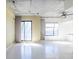 Bright, open living area with polished concrete floors and modern industrial accents at 335 W Ponce De Leon Ave # 506, Decatur, GA 30030