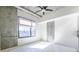 Modern living area with polished floors, ceiling fan, and plenty of natural light at 335 W Ponce De Leon Ave # 506, Decatur, GA 30030