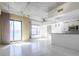 Sunlit living area featuring concrete ceiling, open layout, and modern windows at 335 W Ponce De Leon Ave # 506, Decatur, GA 30030