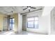 Open concept floor plan offering concrete ceiling and large window for plenty of sunlight at 335 W Ponce De Leon Ave # 506, Decatur, GA 30030