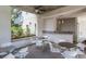 Outdoor kitchen and lounge area featuring comfortable seating and a ceiling fan at 335 W Ponce De Leon Ave # 506, Decatur, GA 30030