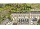 Aerial view showcases townhome community nestled in a wooded area, close to nature at 485 Crescent Woode Dr, Dallas, GA 30157