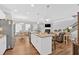 Open floor plan kitchen flows to living and dining area with lots of natural light at 485 Crescent Woode Dr, Dallas, GA 30157