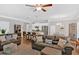 Open-concept living room flowing into a modern kitchen with stainless steel appliances at 485 Crescent Woode Dr, Dallas, GA 30157