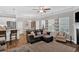 Open-concept living space featuring a living room, dining area, and kitchen at 485 Crescent Woode Dr, Dallas, GA 30157