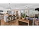 Open floor plan with a modern kitchen island and comfortable living area at 485 Crescent Woode Dr, Dallas, GA 30157
