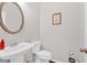 Traditional powder room featuring white fixtures at 485 Crescent Woode Dr, Dallas, GA 30157