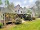 Charming home with a welcoming front porch and lush landscaping at 718 Fincher Rd, Covington, GA 30016