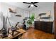 Well-lit bedroom featuring stylish decor, a modern desk setup, and hardwood floors, perfect for a productive workspace at 1963 Main Nw St, Atlanta, GA 30318