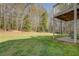 Green yard with deck in background at 240 Arthurs Ln, Covington, GA 30016