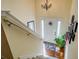 Bright foyer featuring a classic front door and chandelier at 240 Arthurs Ln, Covington, GA 30016