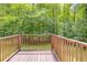 Wooden back deck with views of the woods at 4558 Dorsett Shoals Ct, Douglasville, GA 30135