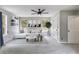 Bright living room with large windows, recessed lighting, and neutral decor at 4558 Dorsett Shoals Ct, Douglasville, GA 30135