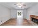 Spacious living room with a brick fireplace and access to the deck at 4558 Dorsett Shoals Ct, Douglasville, GA 30135