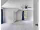 Spacious main bedroom with a modern ceiling fan and ample natural light at 4558 Dorsett Shoals Ct, Douglasville, GA 30135