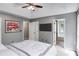 Tranquil main bedroom with en-suite bath, neutral colors, and ample closet space for relaxing comfort at 4558 Dorsett Shoals Ct, Douglasville, GA 30135