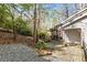 Home exterior featuring a charming wood deck with seating area and an American flag at 131 Cypress St, Roswell, GA 30075