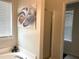 Bright bathroom features a glass-enclosed shower, soaker bathtub and window at 1380 Cedar Hl, Douglasville, GA 30134