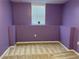 Simple bedroom with a window and neutral carpeting, ideal for creating a cozy retreat at 1380 Cedar Hl, Douglasville, GA 30134