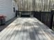 Spacious wooden deck with outdoor seating, perfect for enjoying the surrounding nature at 1380 Cedar Hl, Douglasville, GA 30134