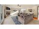 Cozy living room with a stone fireplace, plush seating, and neutral decor at 1526 Rocky River Dr, Lawrenceville, GA 30045