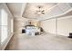 Large main bedroom with trey ceiling, natural lighting, and cozy sitting area at 1526 Rocky River Dr, Lawrenceville, GA 30045