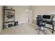 Functional office space with ample storage, ergonomic chair, and plenty of natural light at 1526 Rocky River Dr, Lawrenceville, GA 30045