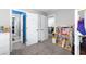 Hallway with multiple rooms and doors at 5081 Stone Moss Way, Hoschton, GA 30548