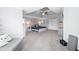 A spacious main bedroom with tray ceilings and neutral decor at 5081 Stone Moss Way, Hoschton, GA 30548