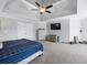 Spacious main bedroom with large walk-in closet and television at 5081 Stone Moss Way, Hoschton, GA 30548
