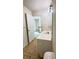 Neat bathroom featuring a sleek vanity, mirror and neutral-toned flooring at 771 Franklin Mill Trce, Loganville, GA 30052