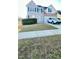 Charming two-story home with a well-manicured lawn and a white SUV parked in the driveway at 771 Franklin Mill Trce, Loganville, GA 30052