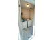 Convenient laundry room with washer, dryer, and shelving for storage at 771 Franklin Mill Trce, Loganville, GA 30052