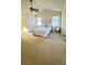 Spacious main bedroom featuring a ceiling fan and large windows at 771 Franklin Mill Trce, Loganville, GA 30052