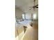Spacious main bedroom featuring a ceiling fan and large windows at 771 Franklin Mill Trce, Loganville, GA 30052