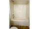 Clean shower and tub combination with white tiling at 771 Franklin Mill Trce, Loganville, GA 30052