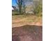 Expansive backyard, providing ample space for gardening, recreation, or future outdoor renovations at 1253 Gus Thornhill Jr Dr, Atlanta, GA 30344