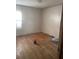 Cozy bedroom featuring hardwood floors and a window, offering a blank canvas for personalization at 1253 Gus Thornhill Jr Dr, Atlanta, GA 30344