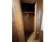 A closet featuring paneled walls, a high shelf, and laminate flooring at 1253 Gus Thornhill Jr Dr, Atlanta, GA 30344
