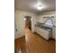 Compact kitchen featuring essential appliances with tile flooring at 1253 Gus Thornhill Jr Dr, Atlanta, GA 30344