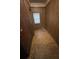 This room features wood paneling, and a window that lets in natural light at 1253 Gus Thornhill Jr Dr, Atlanta, GA 30344