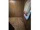This room features wood paneling, and a curtained window that lets in natural light at 1253 Gus Thornhill Jr Dr, Atlanta, GA 30344