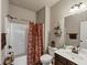 Clean bathroom featuring a shower-tub combo, vanity with sink, and modern fixtures at 1332 Worcester Trl, Mcdonough, GA 30253